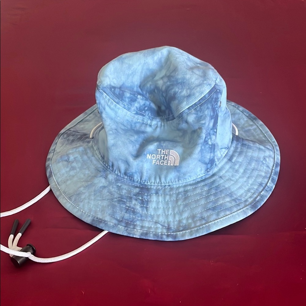 The North Face Blue Bucket Hat with Wide Brim and Chin Strap
